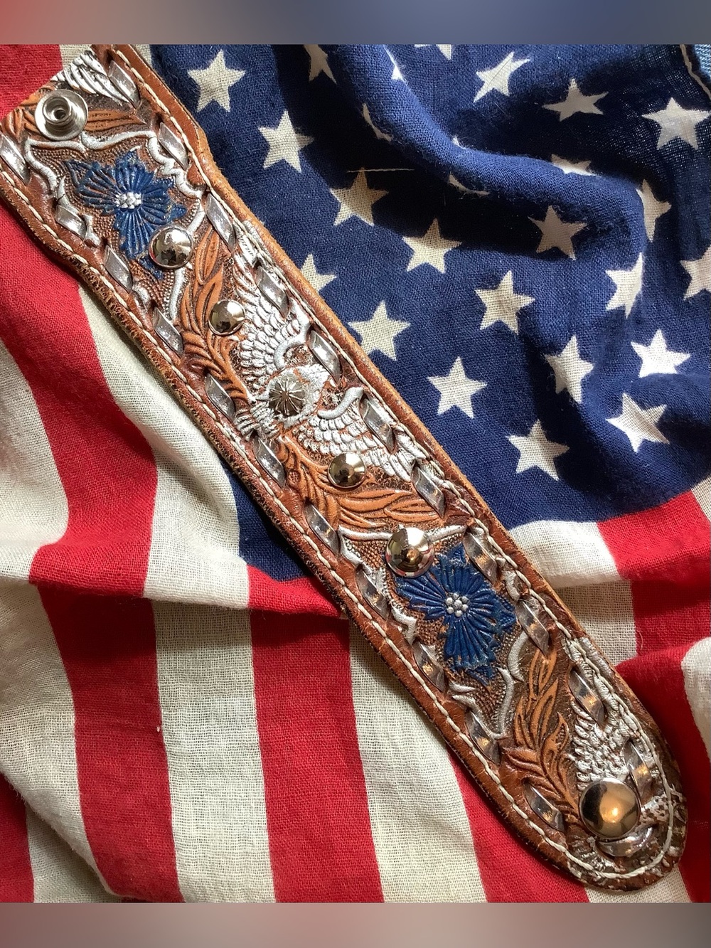 Tooled leather cuff , up to 7” wrist